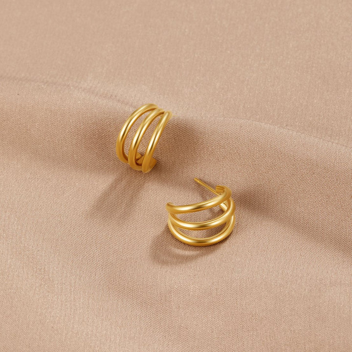 Ohrringe mit dreifacher Kurve