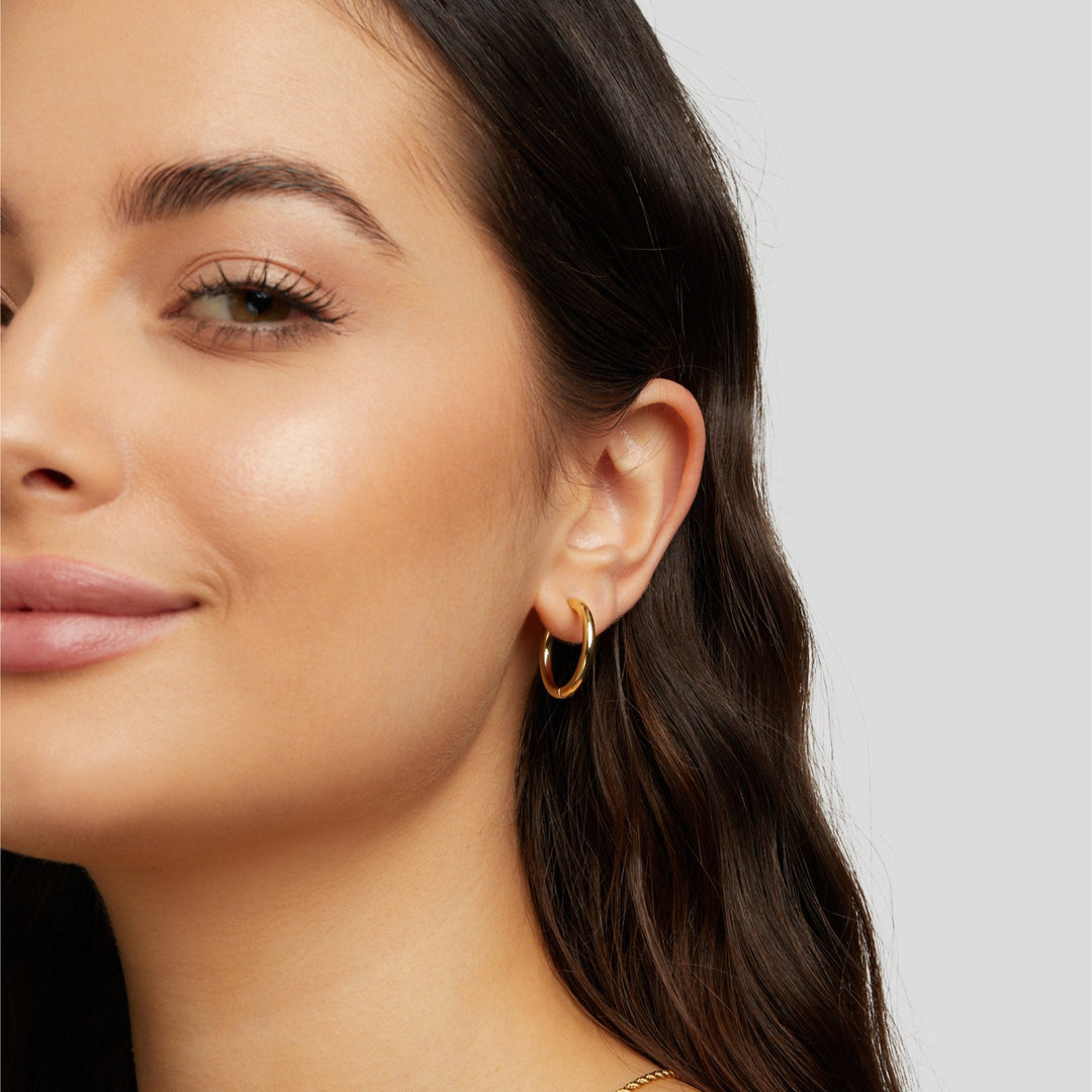 Elegante goldene Creolen